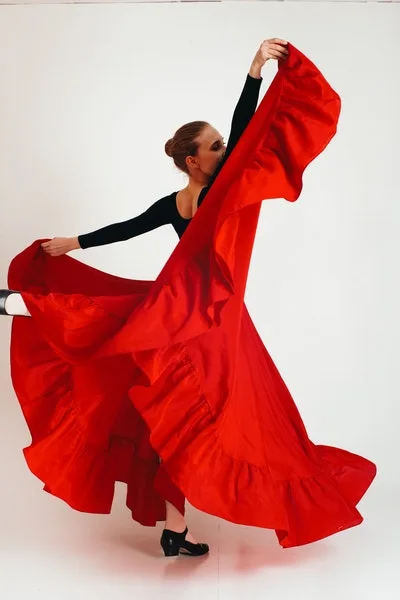 Adults learning flamenco at a dance class in Blackpool