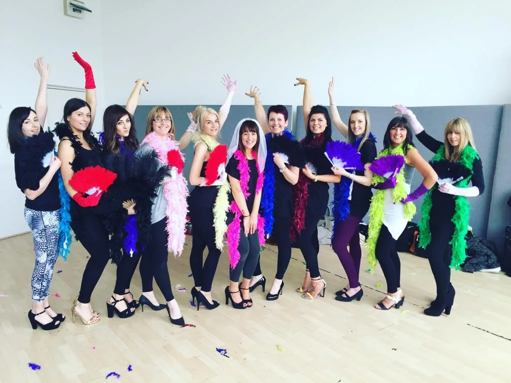 Burlesque hen party dance class Bolton group with feather boas