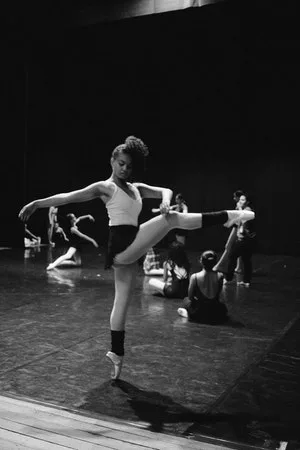 Adults learning ballet at a dance class in Canterbury