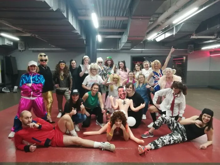 90s hen party dance class Liverpool group striking a pose